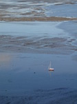 SX11928 Beached sailboat on Swansea Bay mud sands.jpg
